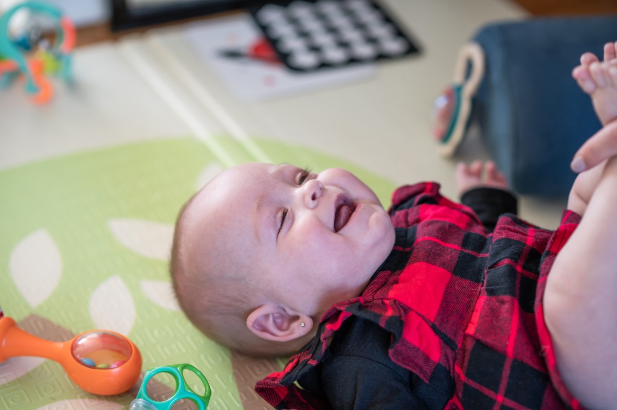 baby playing on floor